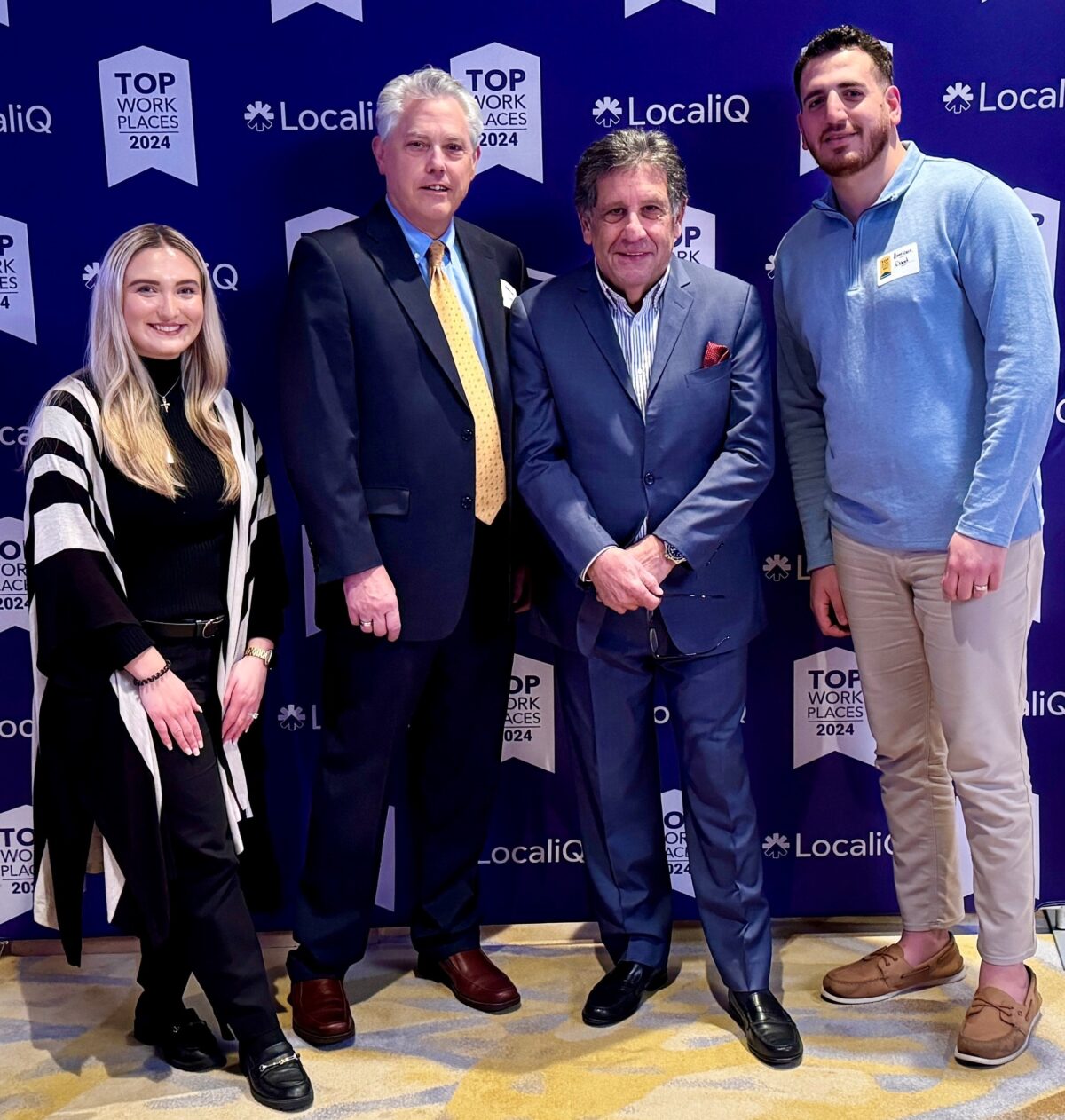 AmeriCare Medical team at the 2024 Top Workplace event. From left to right: Madelyn Dedaj (Marketing Specialist); Dan Hamann (Human Resources Director); Greg Jamian (President & CEO); David Kashat (Human Resources & Recruiting).