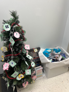 AmeriCare Medical’s tree was decorated with ornaments representing gift requests for each member of the sponsored family. 